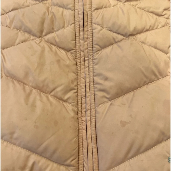 The north face 
Pink puffer vest 
Pilling on inside, Small stains on front - Picture 7 of 9